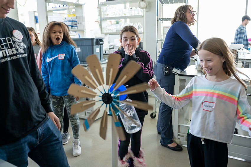 Surprising results! A successful wind turbine powers a pulley system to lift up a heavy water bottle.
