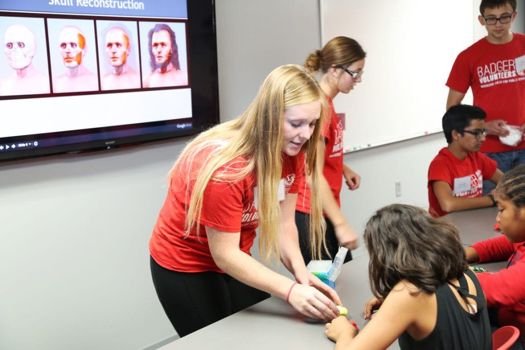 Participants learned about the steps of facial reconstruction-- scientists often start with a skull, then add muscle, skin and hair to create a model. In this activity, kids used 3D printed skulls and modeling clay to try the process for themselves.