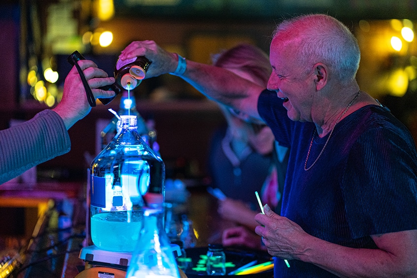 Concocting fluorescent cocktails at the “Kiss My Glass” event.